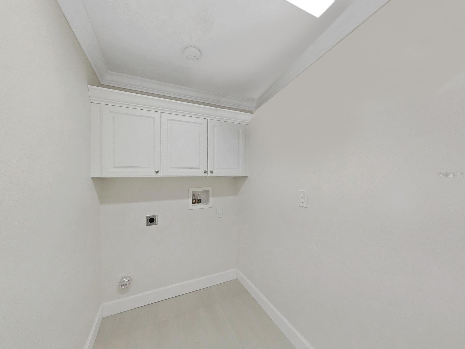 Ensuite laundry room and storage