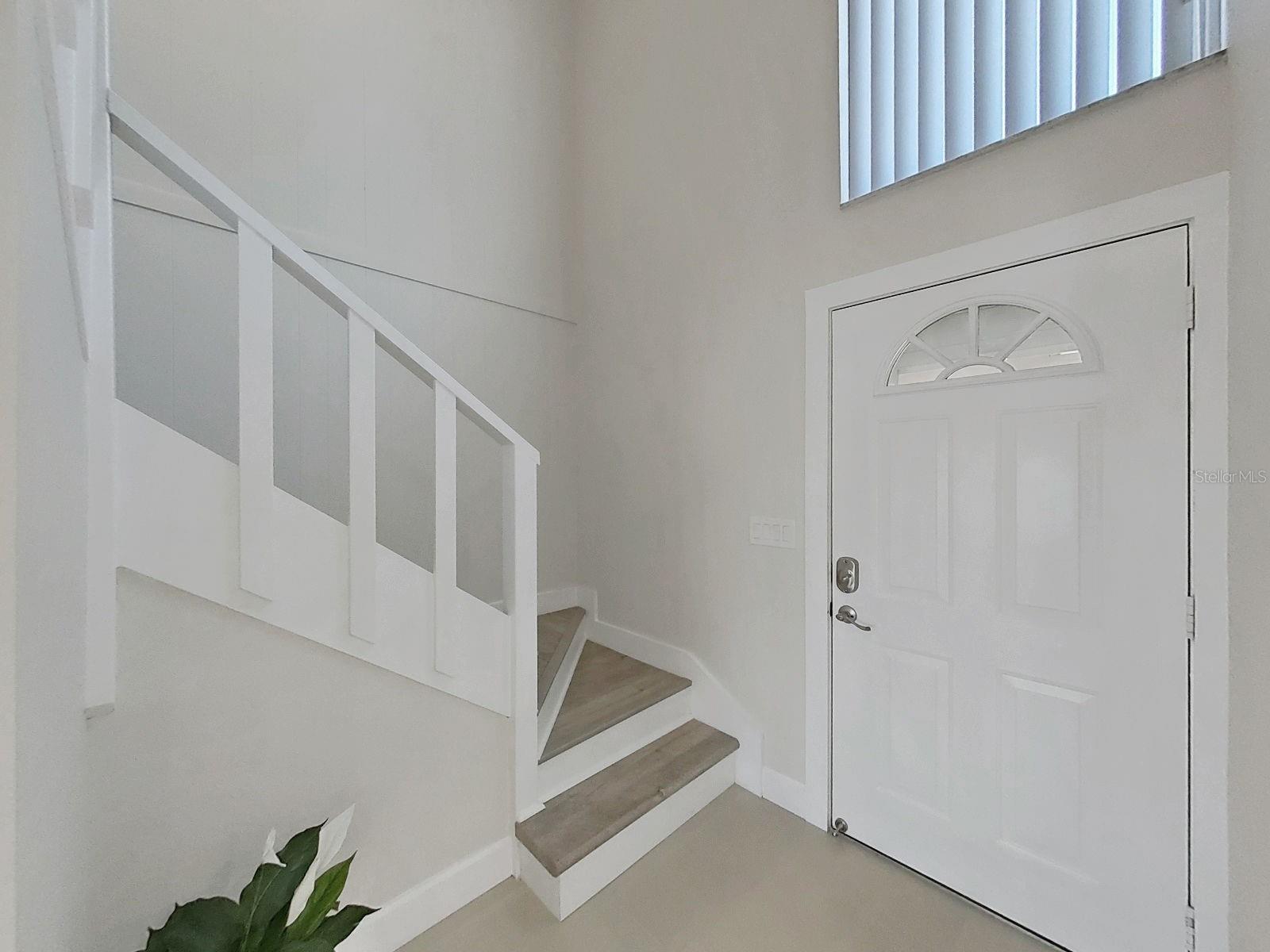 Wood handrails with no carpet on steps