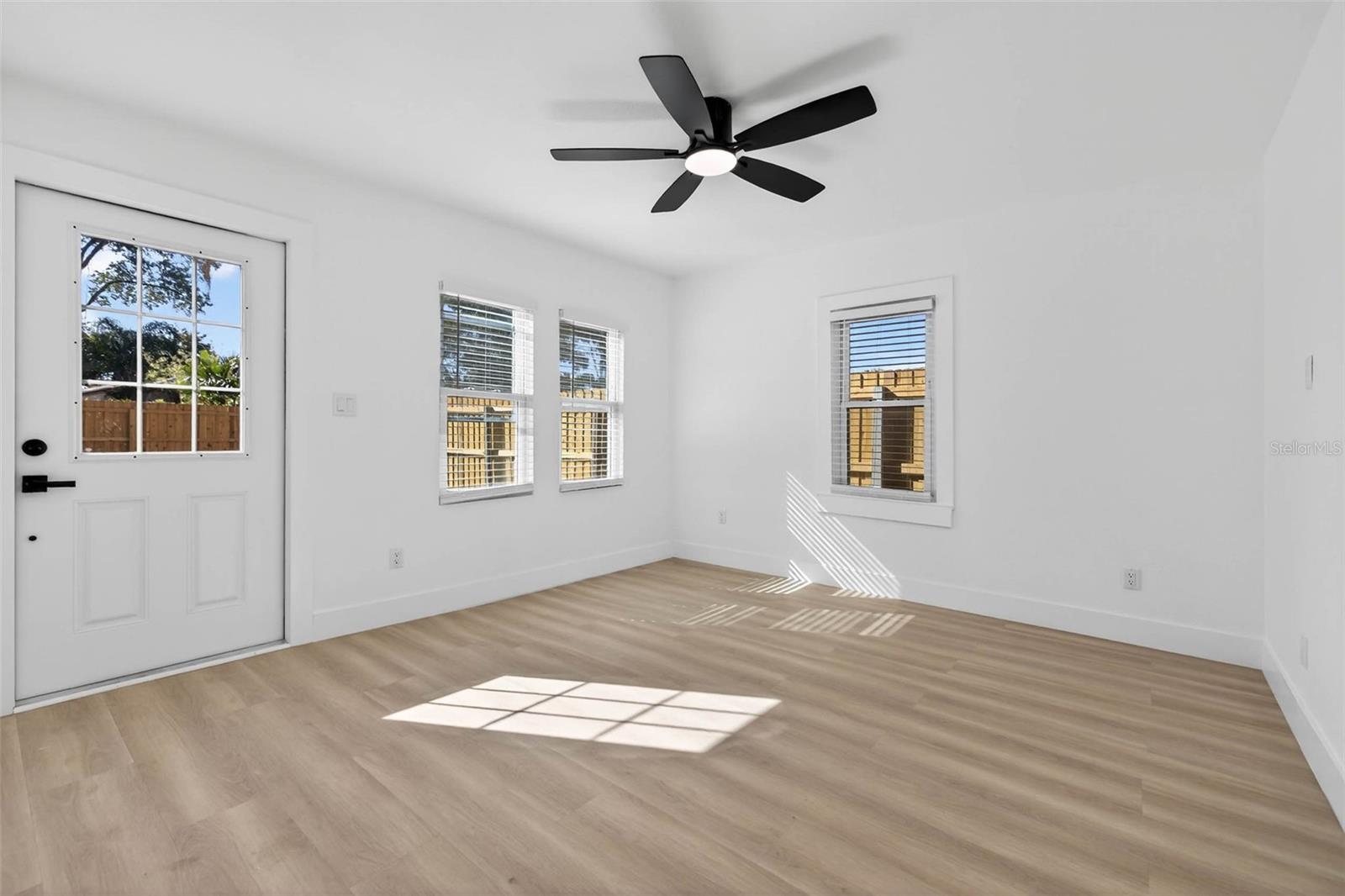 Downstairs Bedroom #4 leads to the backyard