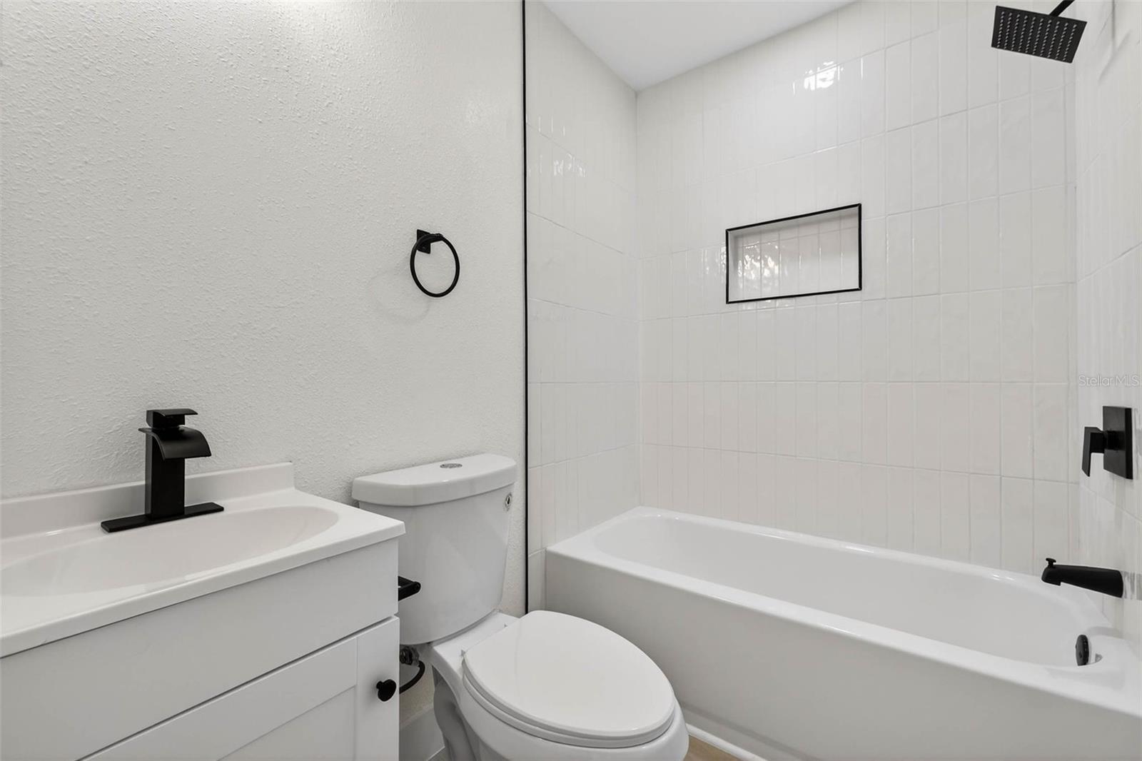 Upstairs Hallway Bathroom with a tub/shower combo