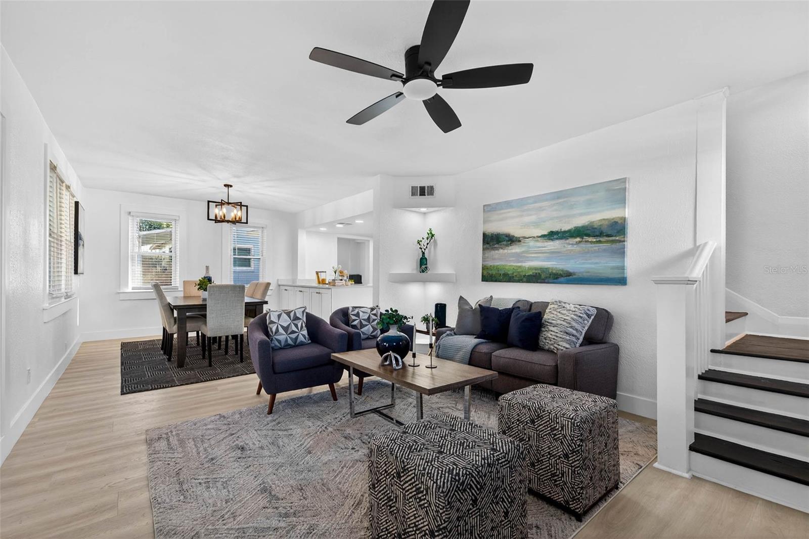 Bright, open design connecting kitchen, dining, and living areas