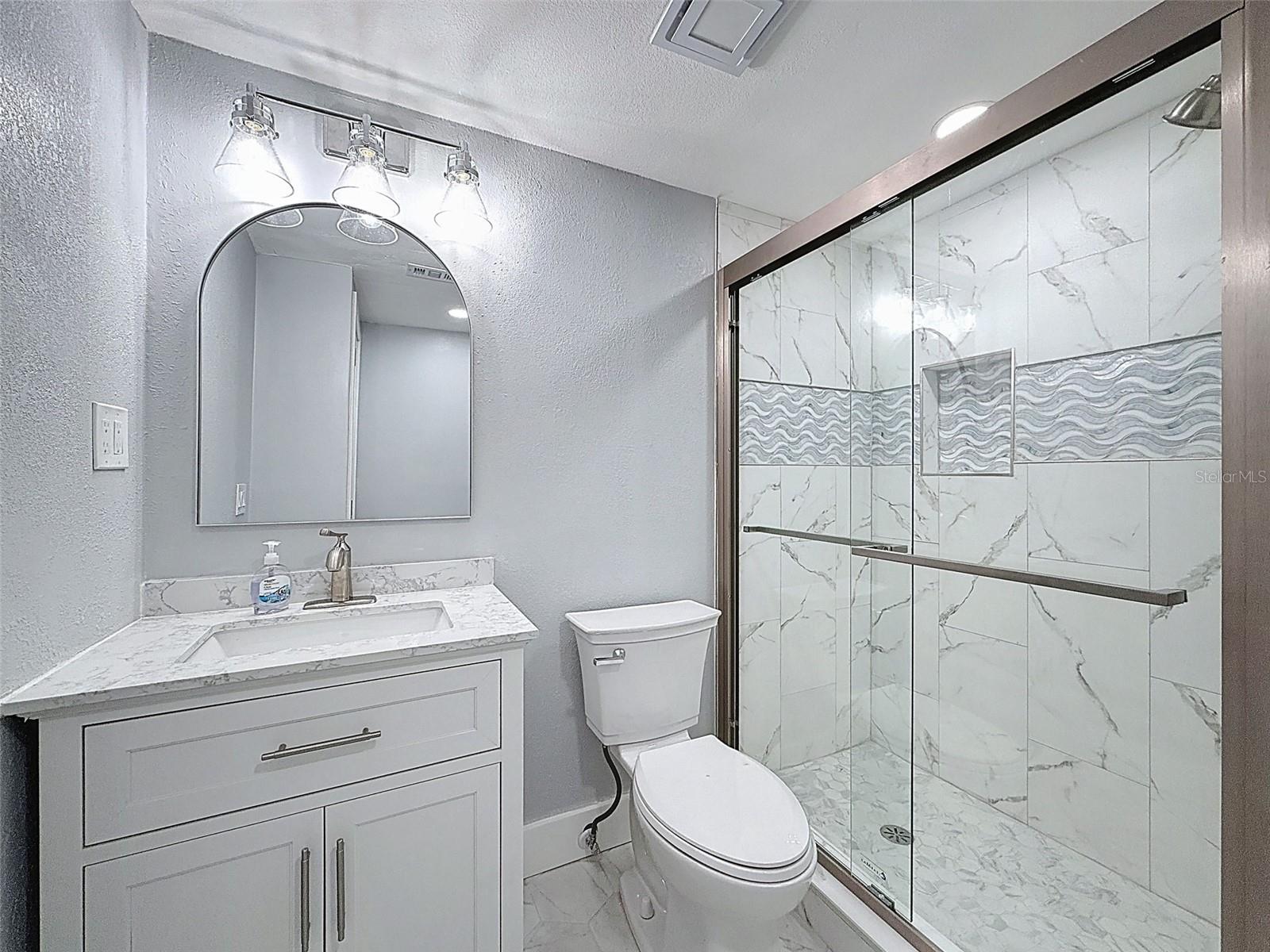 THIS BATH IS LOCATED TOWARD THE FRONT OF THE HOME. BEAUTIFUL!