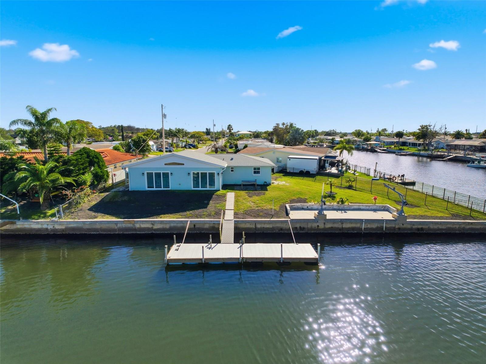 A DOUBLE CORNER LOT 125 FEET OF SEAWALL