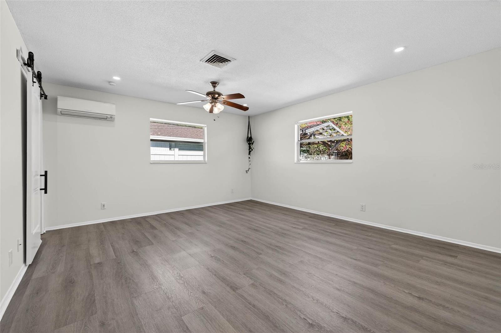 Oversized primary bedroom with central AC and private mini split