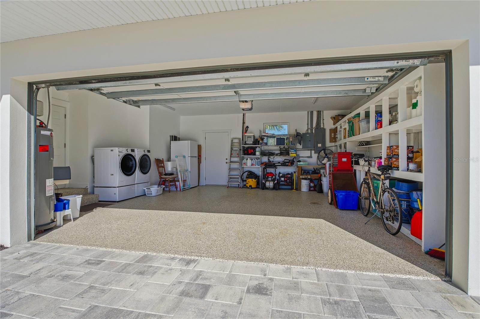 NEW EPOXY COATING ON GARAGE FLOOR AND LOOK AT ALL THE ORGANIZATION/STORAGE!