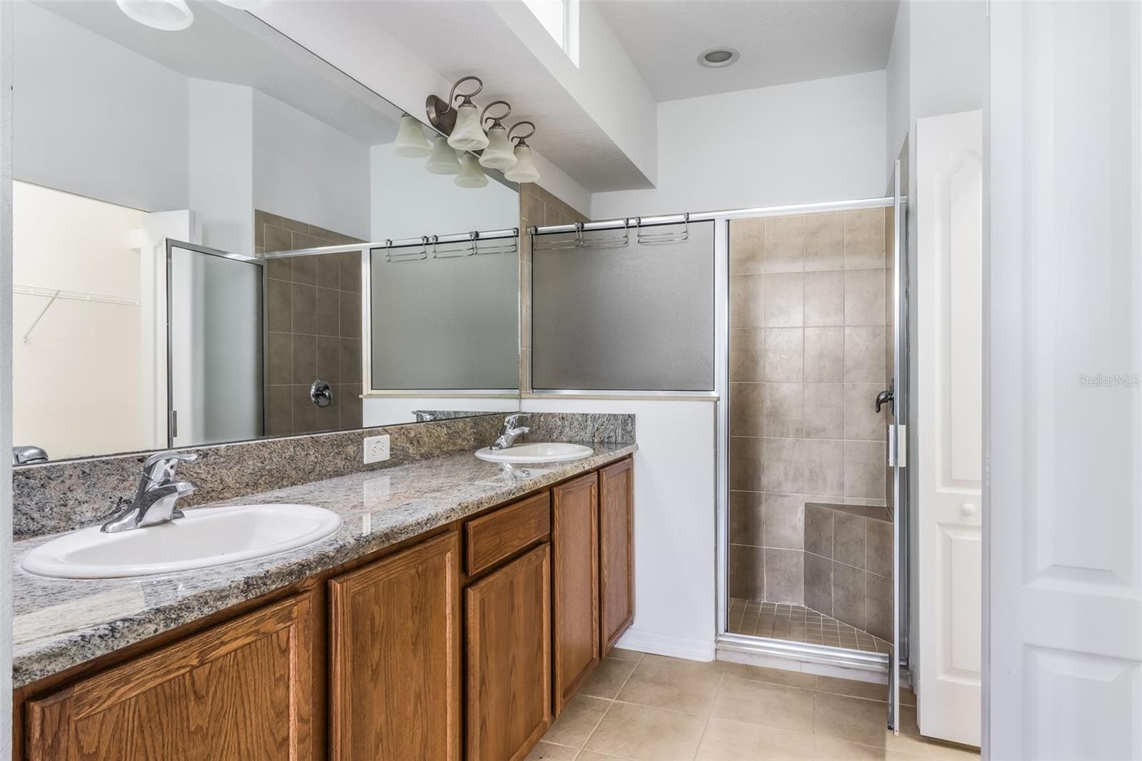 Primary Bathroom - walk in shower and walkin closet