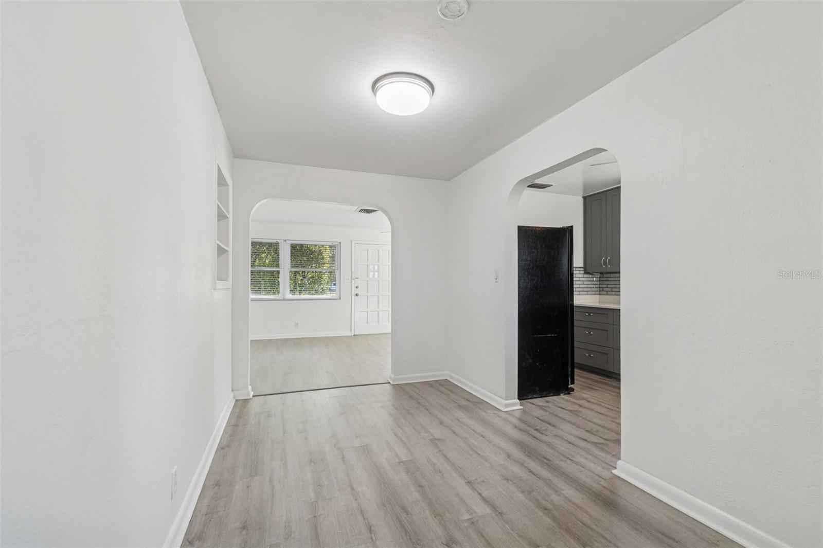 Dining room opens to living room and kitchen