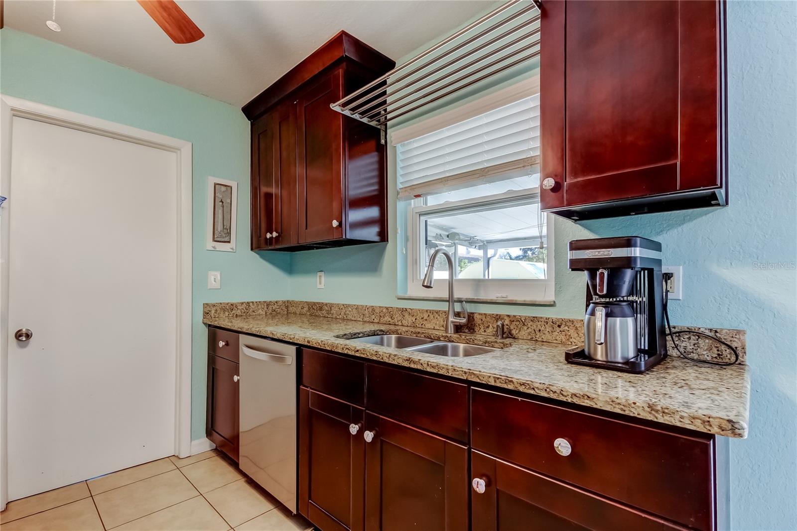 Granite Counter Tops and Cherry Wood Cabinets
