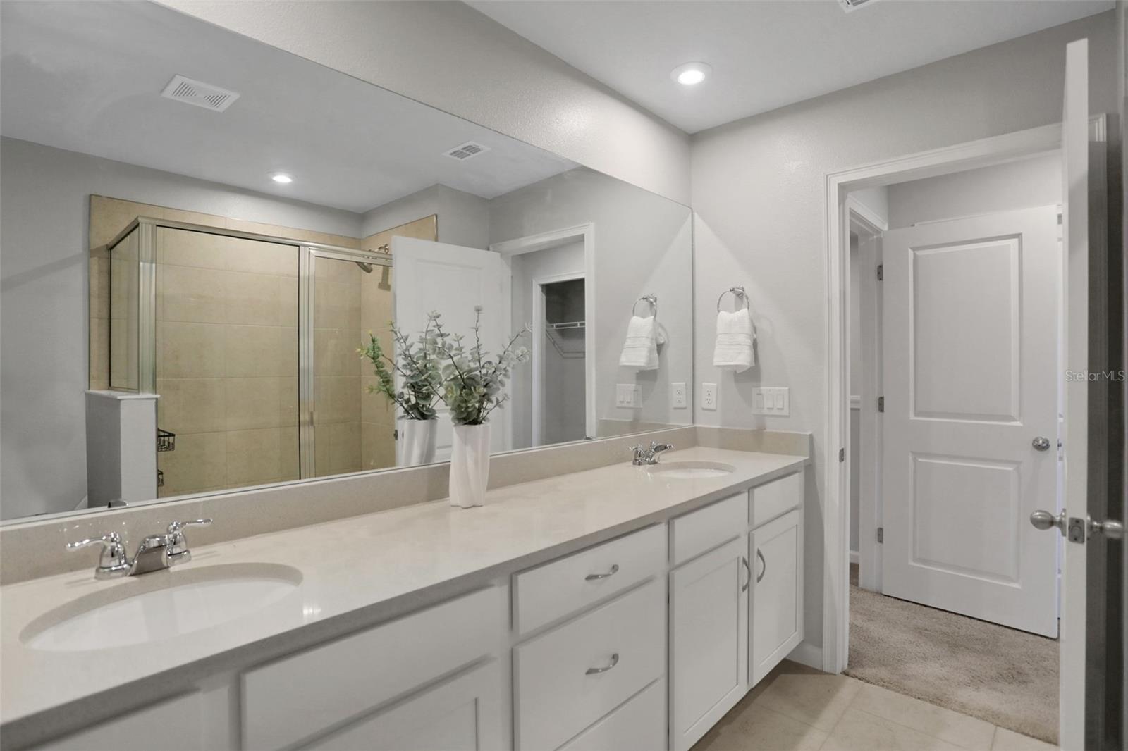 Large bathroom countertop & cabinets