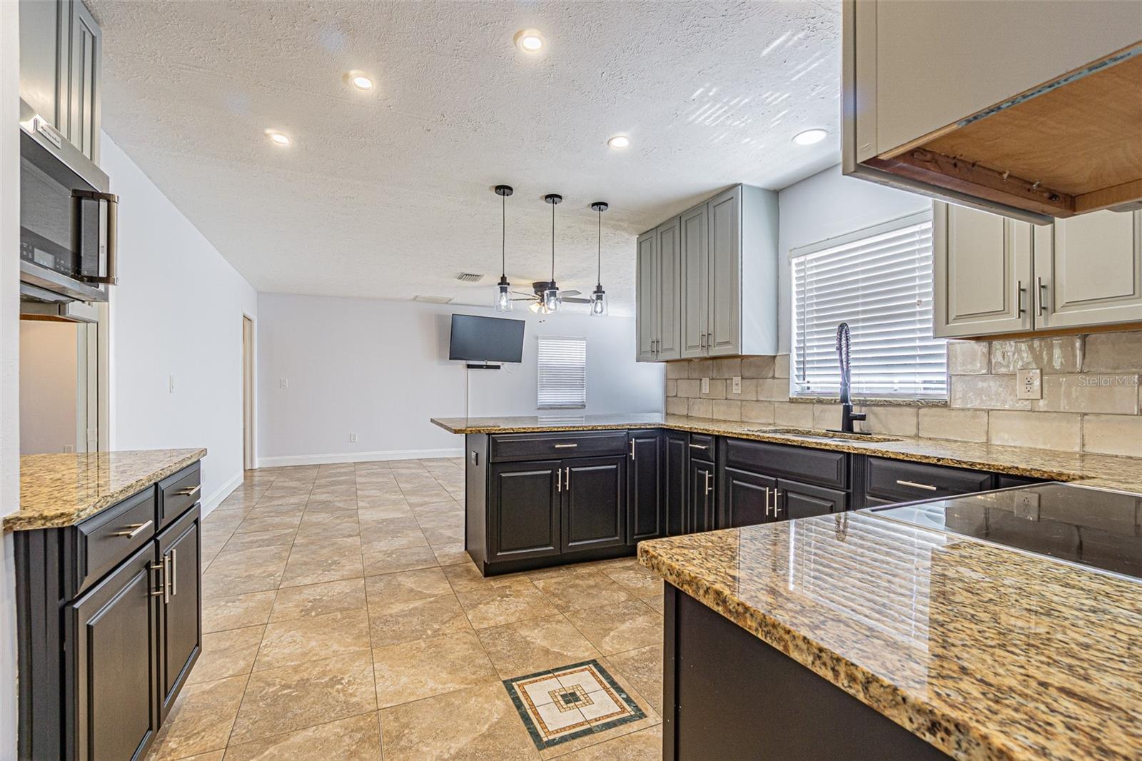 Kitchen opening to family room