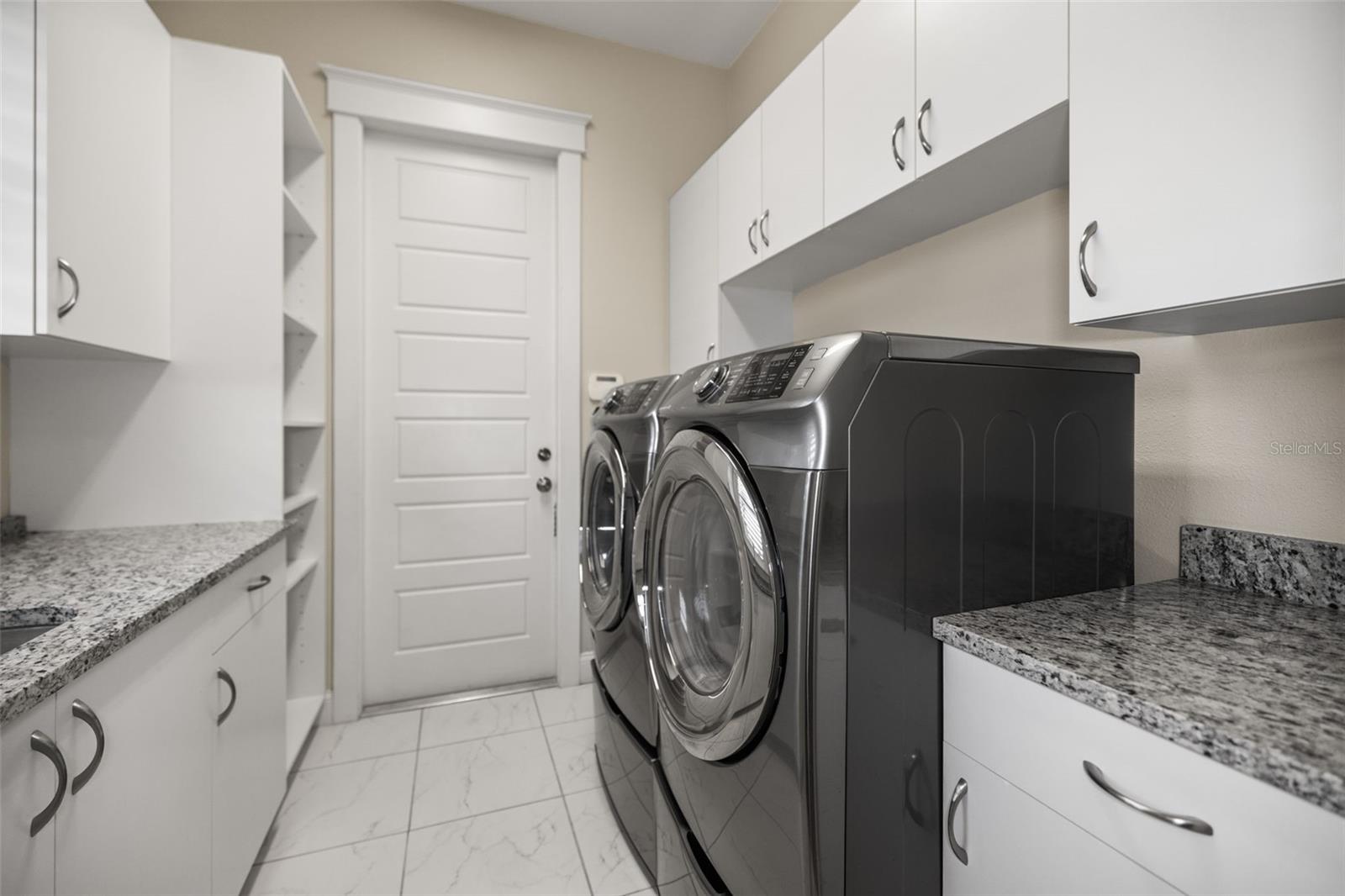 Laundry Room off of kitchen, Leading into 2 Car Garage