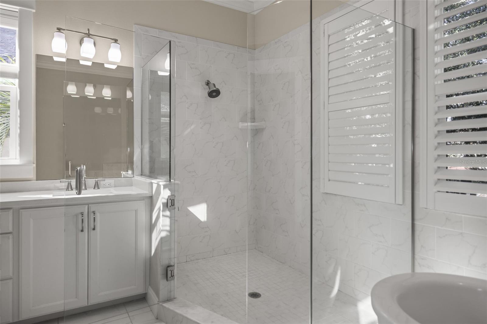 Primary Bathroom with Shower and Free Standing Tub