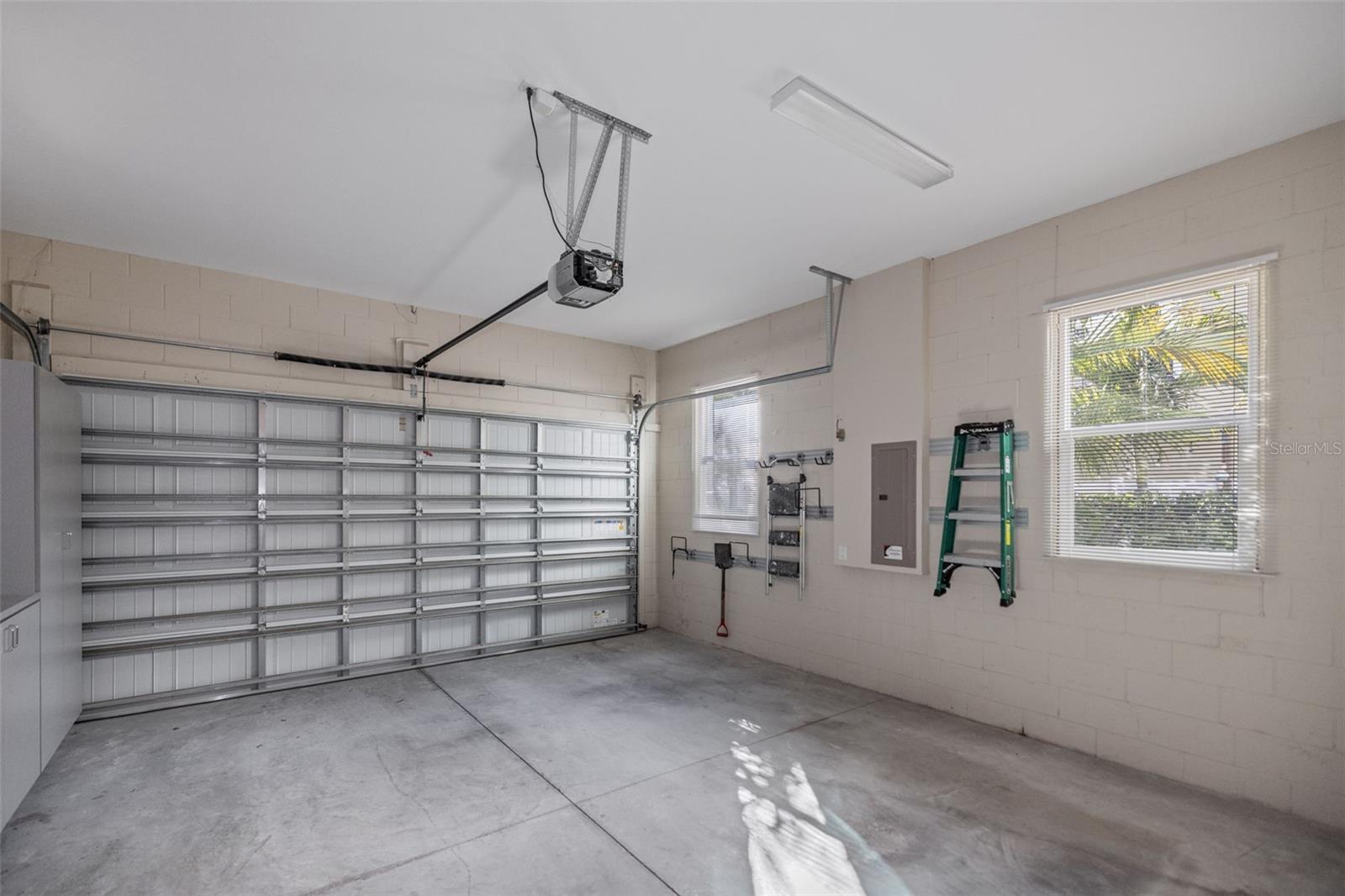 Spacious 2 car Garage with Cabinetry