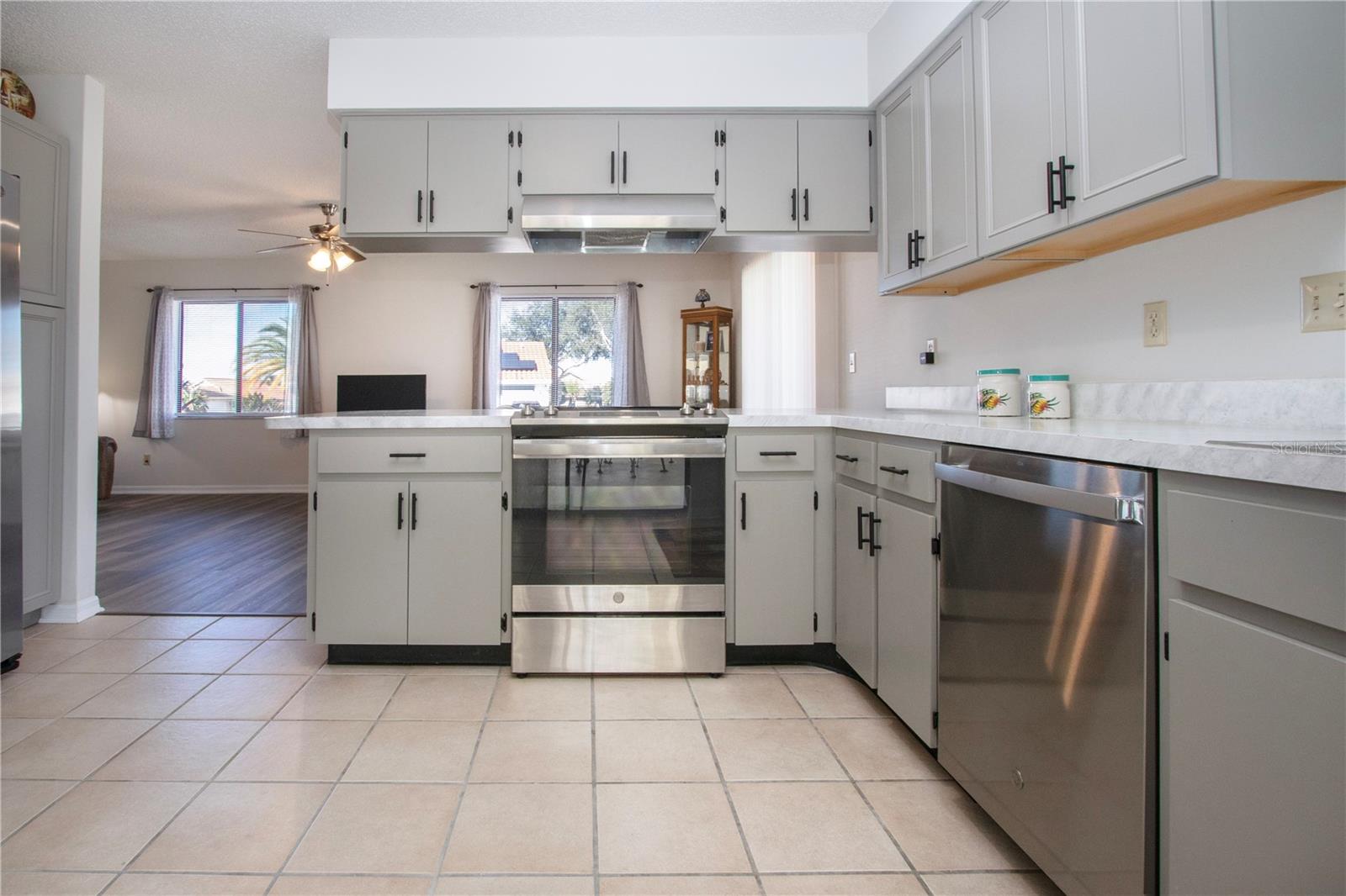 Kitchen with view of family room