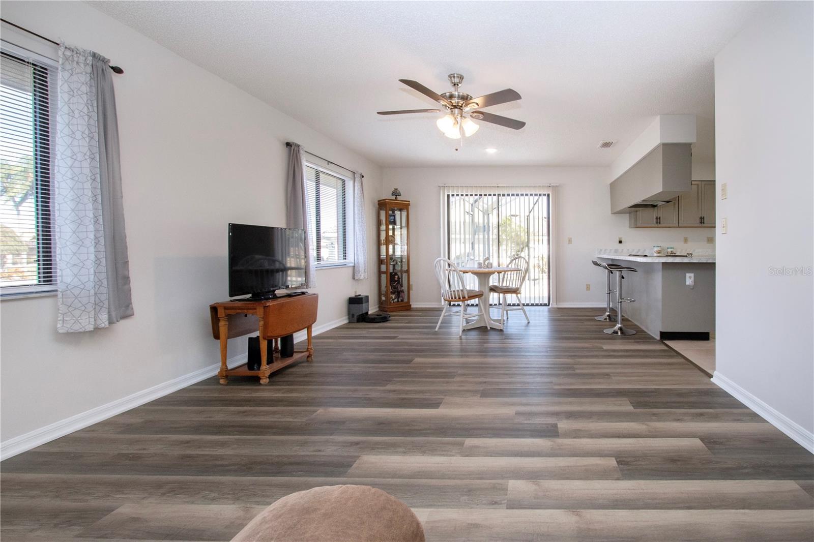 Family room with sliders to pool area