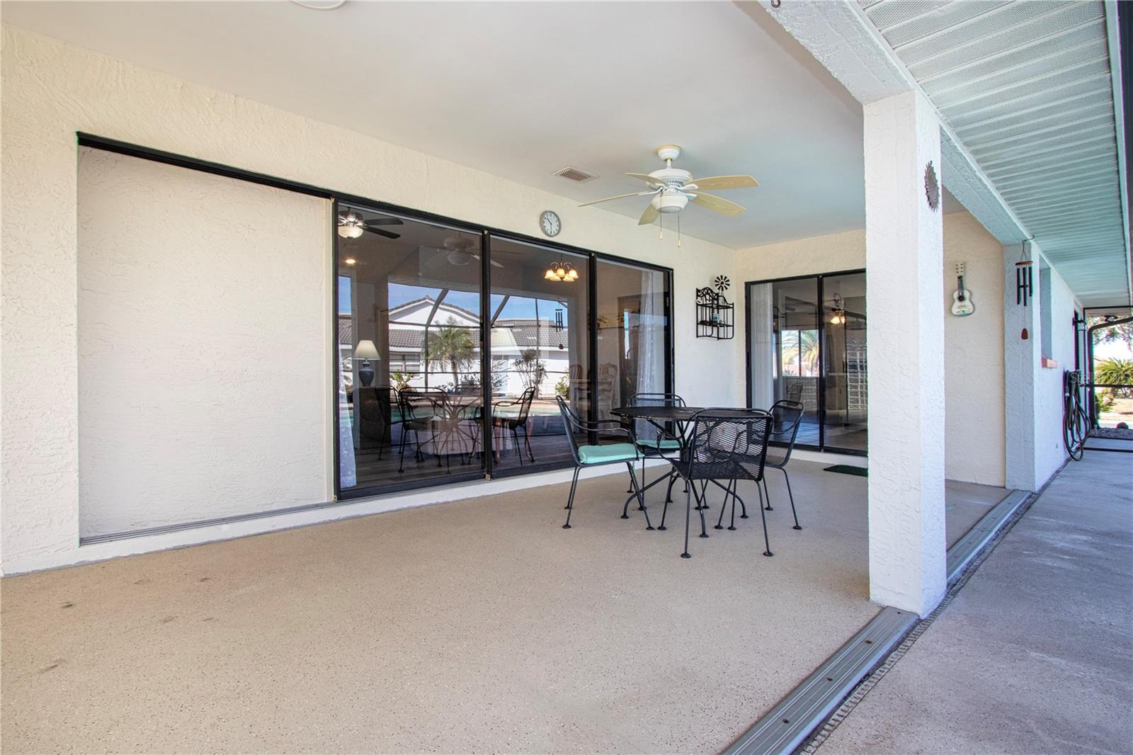 Lanai with sliders to great room and family room