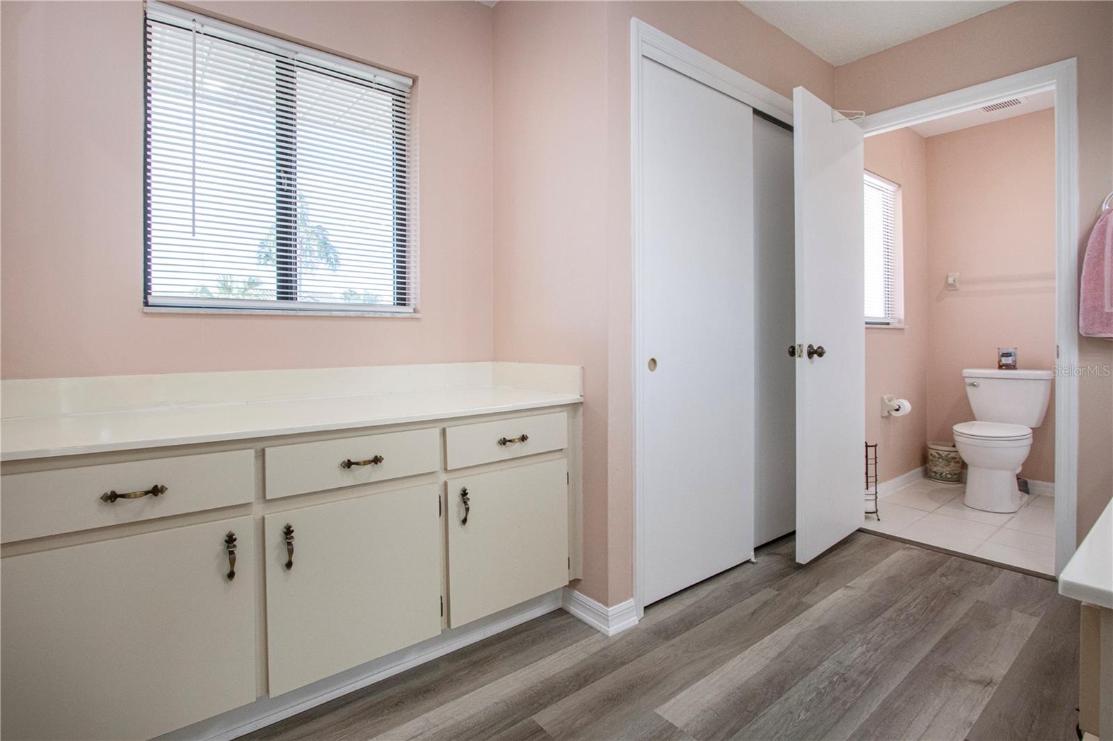 Master bath with private commode and lots of cabinet space