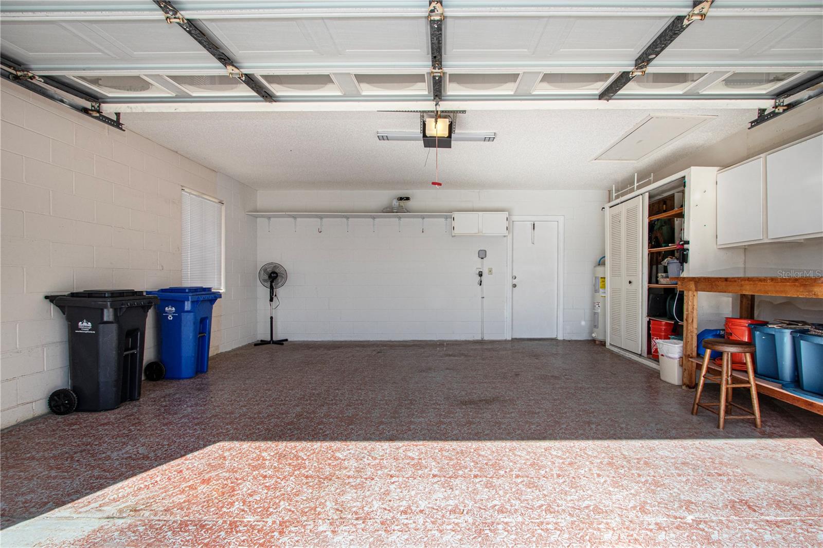 Two-car garage with storage and work bench