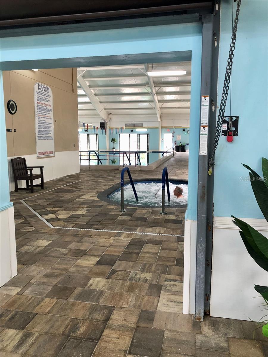 Inside hot tub and lap pool