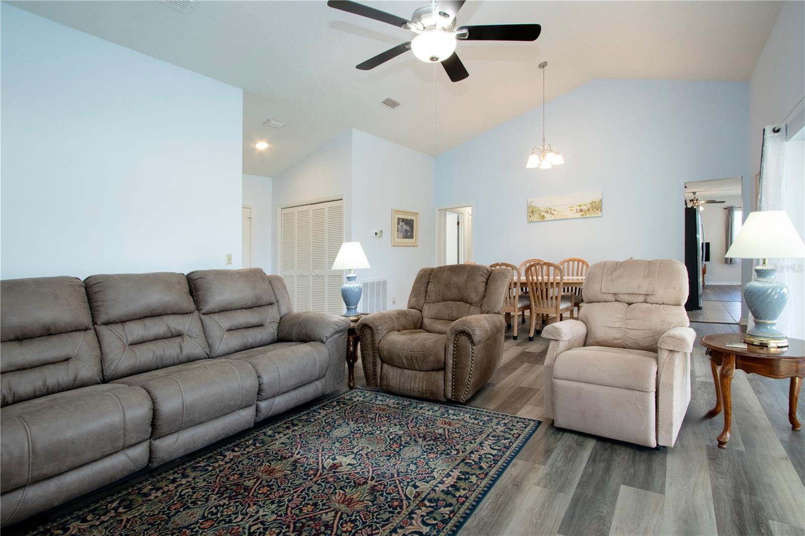 Living room with dining area behind