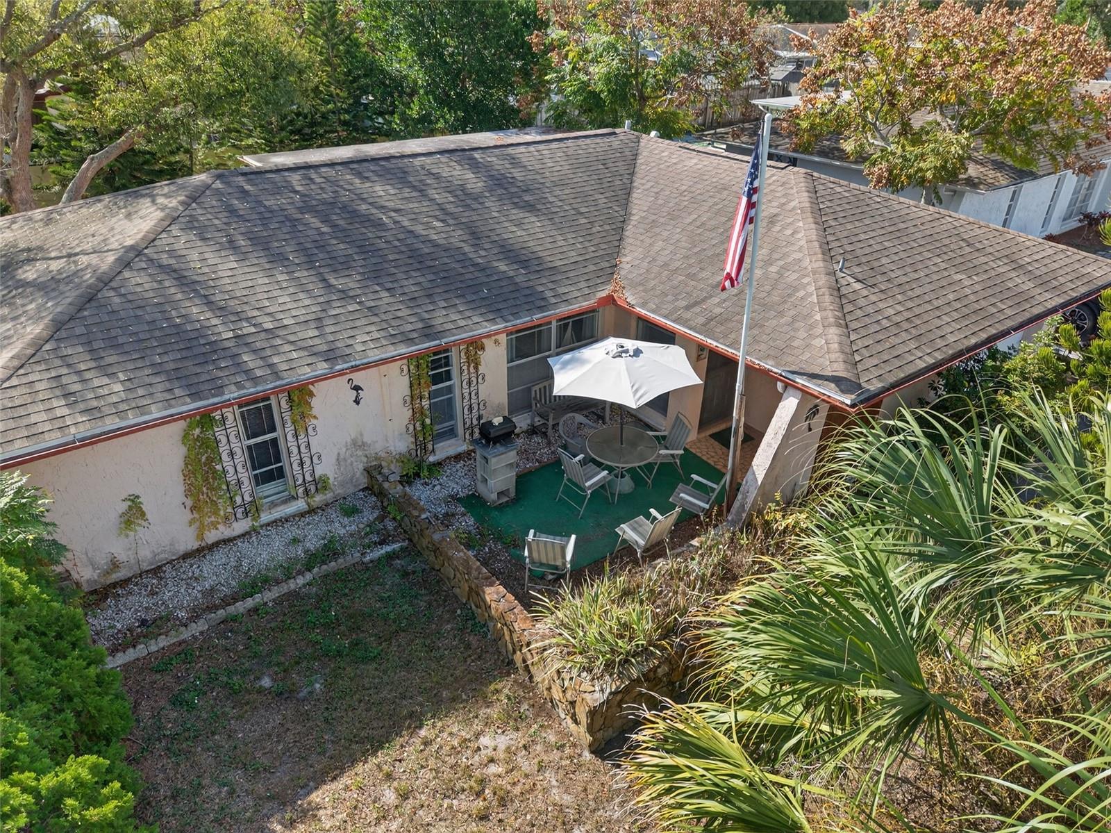 A private patio at the front of a home is a rarity and offers extra pleasing outdoor space