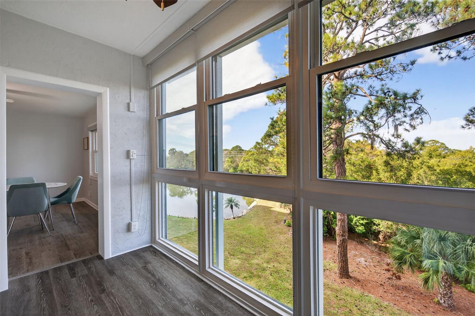 Floor to Ceiling Windows off the Bedroom