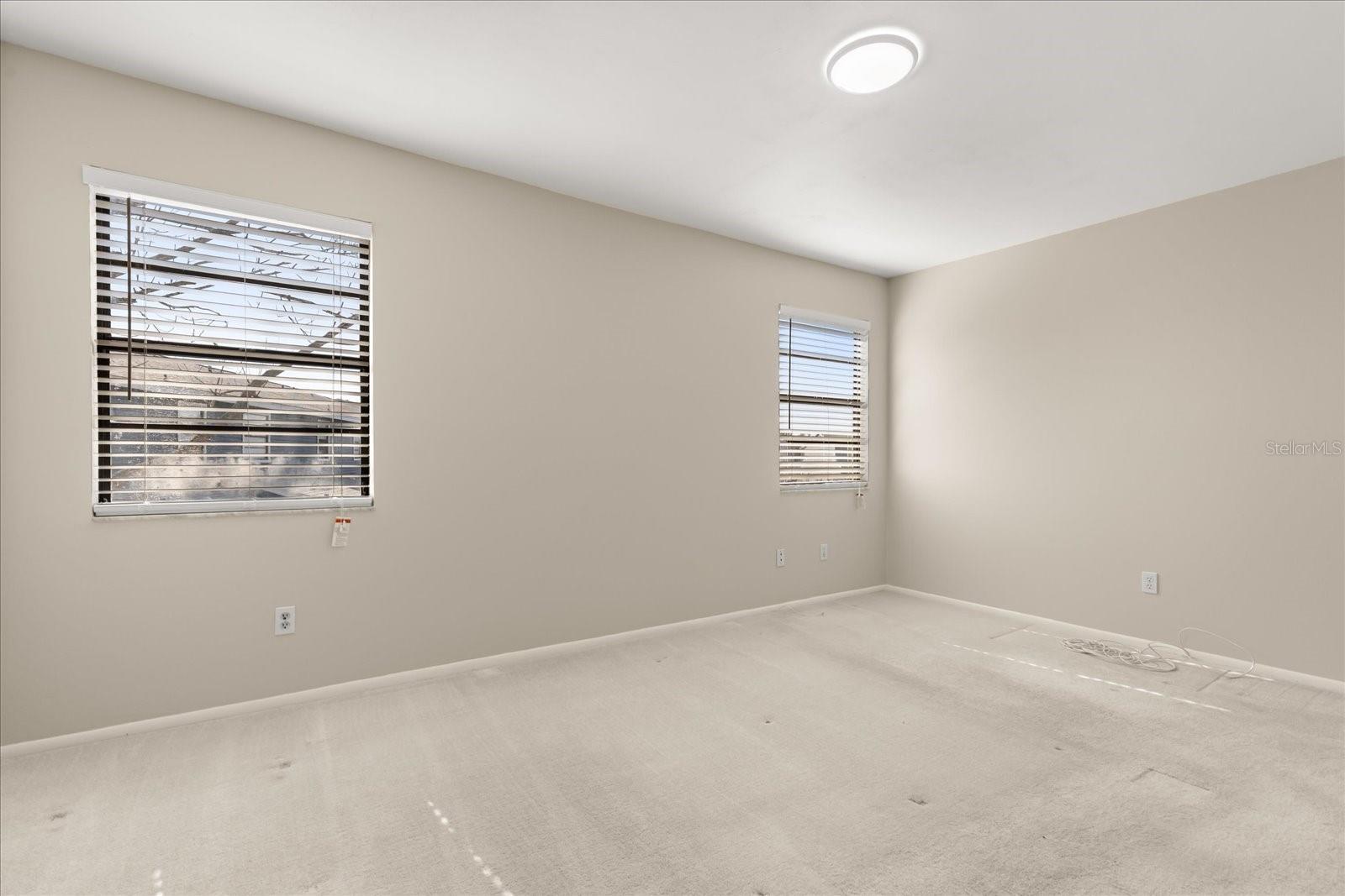 Primary bedroom w/water views