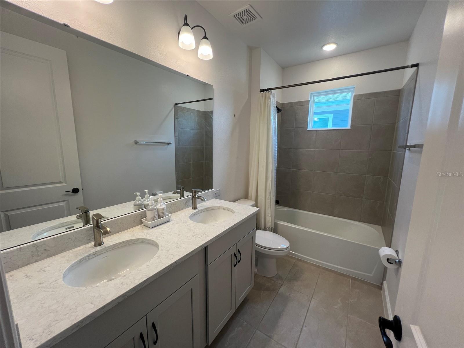 Full Size Bathroom Upstairs with Dual Sinks