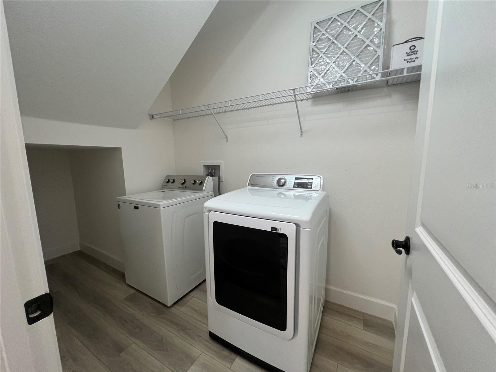 Laundry Room with extra under stairs storage