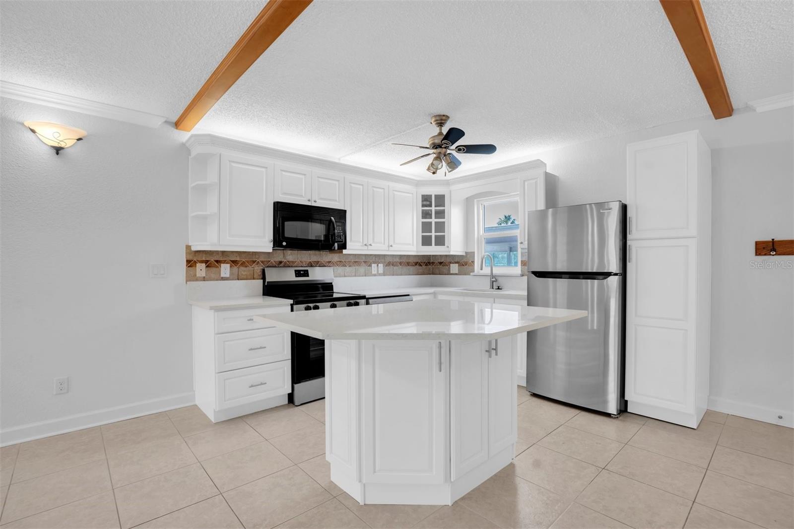 BRAND NEW KITCHEN LOOKING OUT AT YOUR CARPORT