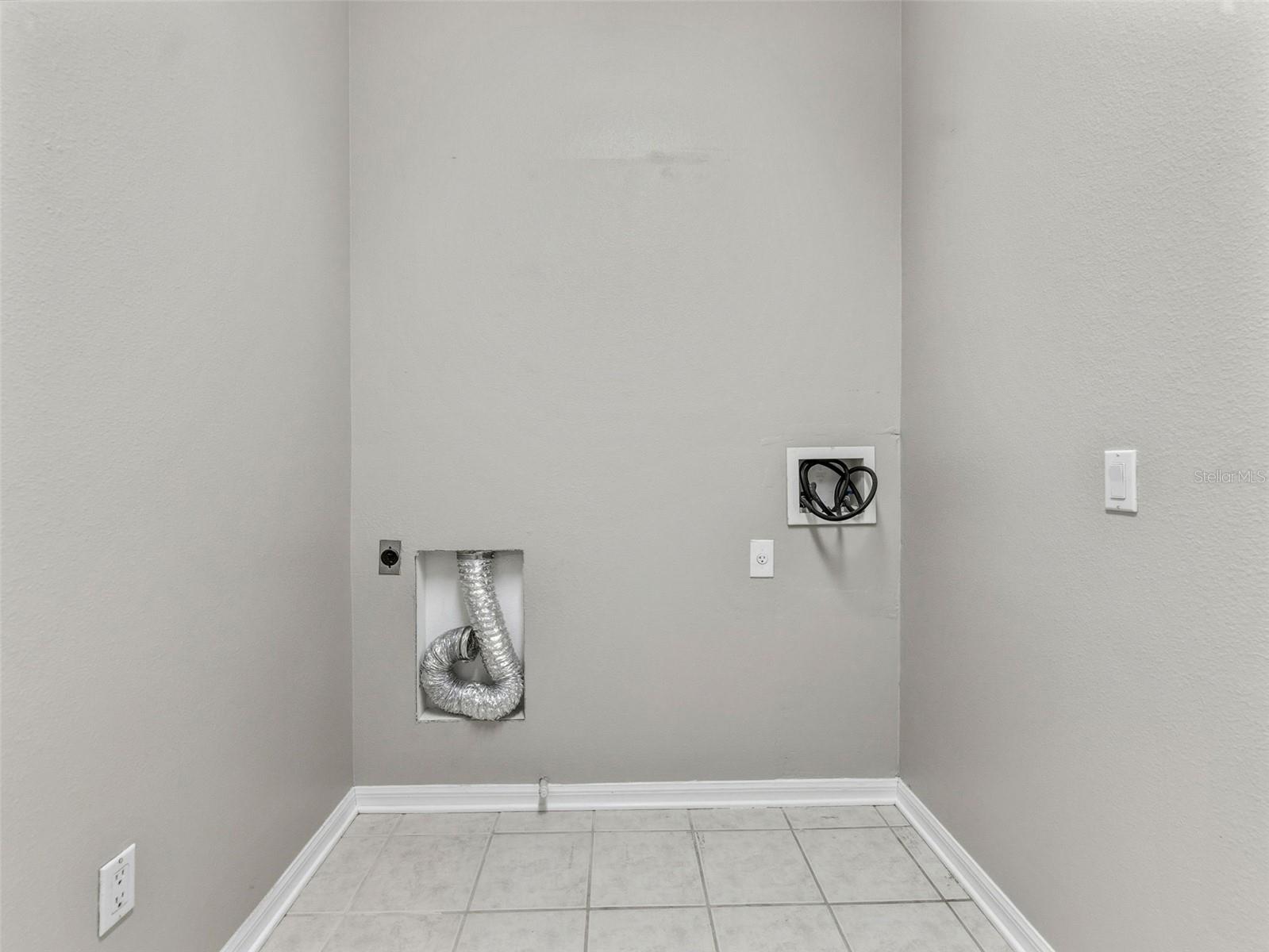 Laundry room off garage