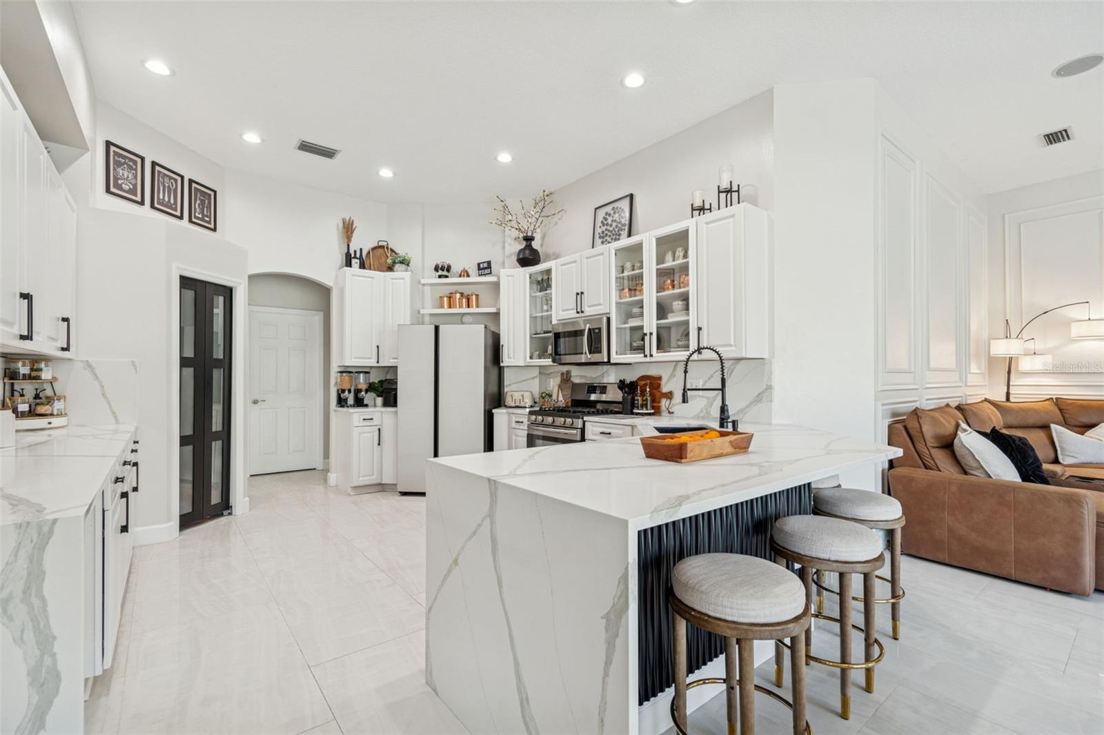Custom decorative kickplate at breakfast bar.
