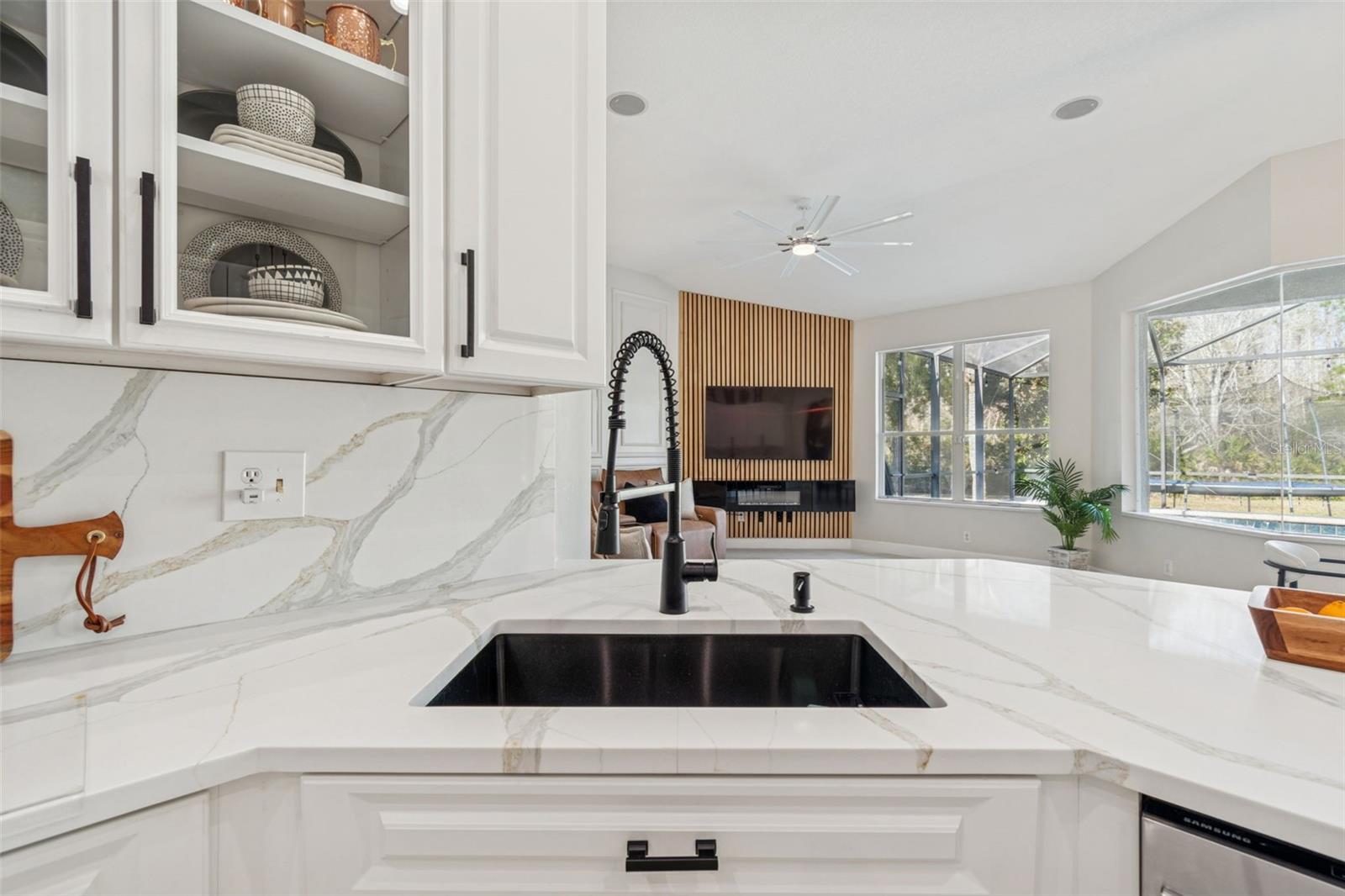 Gorgeous view into family room and backyard.