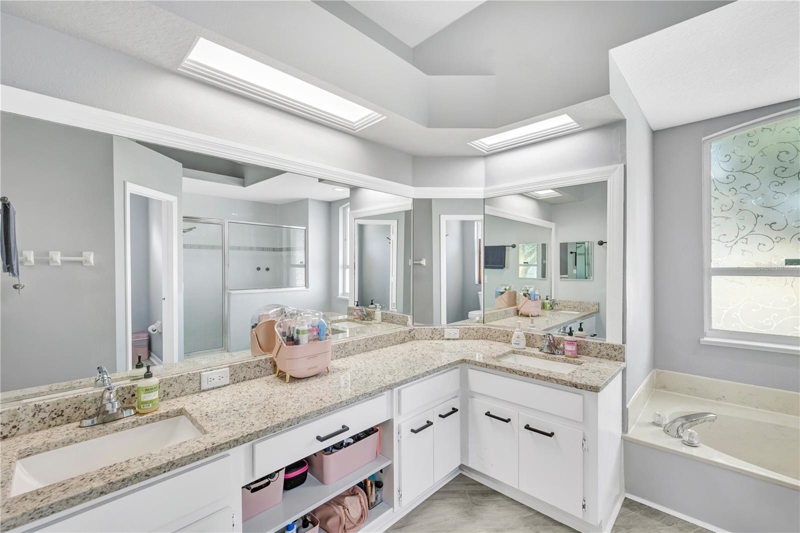 The large vanity has plenty of storage for all of your essentials.