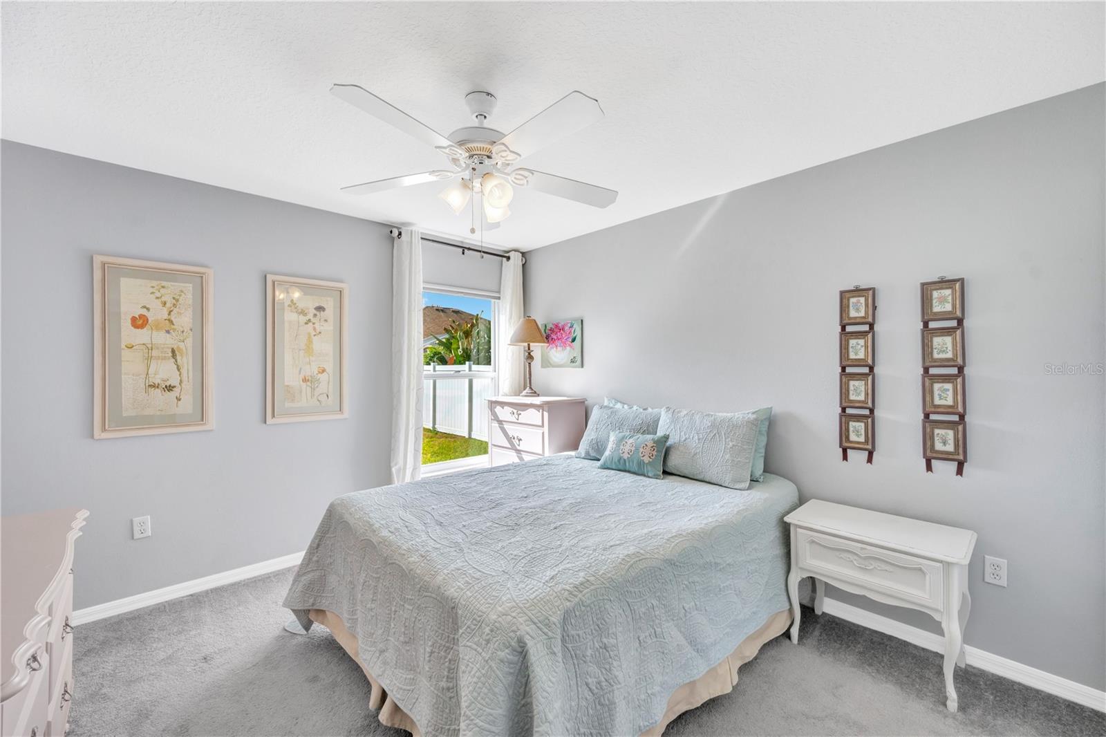 Bedroom #2 has carpet, ceiling fan and built-in closet.