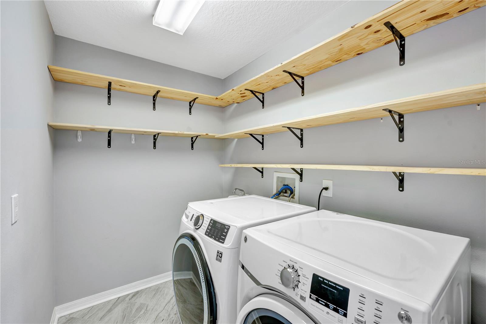 Inside Utility room has a convenient utility sink.  Washer & Dryer are negotiable.