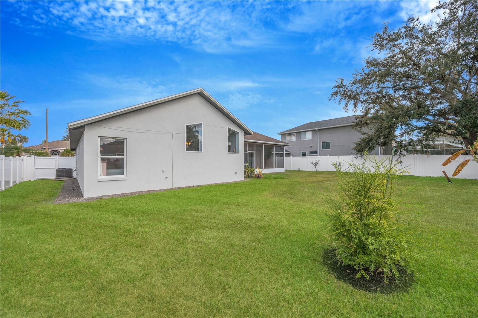 There is access into the backyard from a gate on the western side of the home.