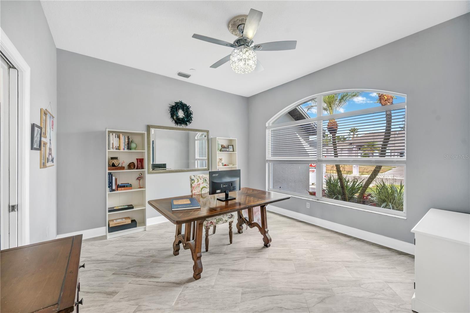 Upon entry, you’re greeted by an open living and dining space accented with high ceilings and durable, stylish tile flooring throughout.