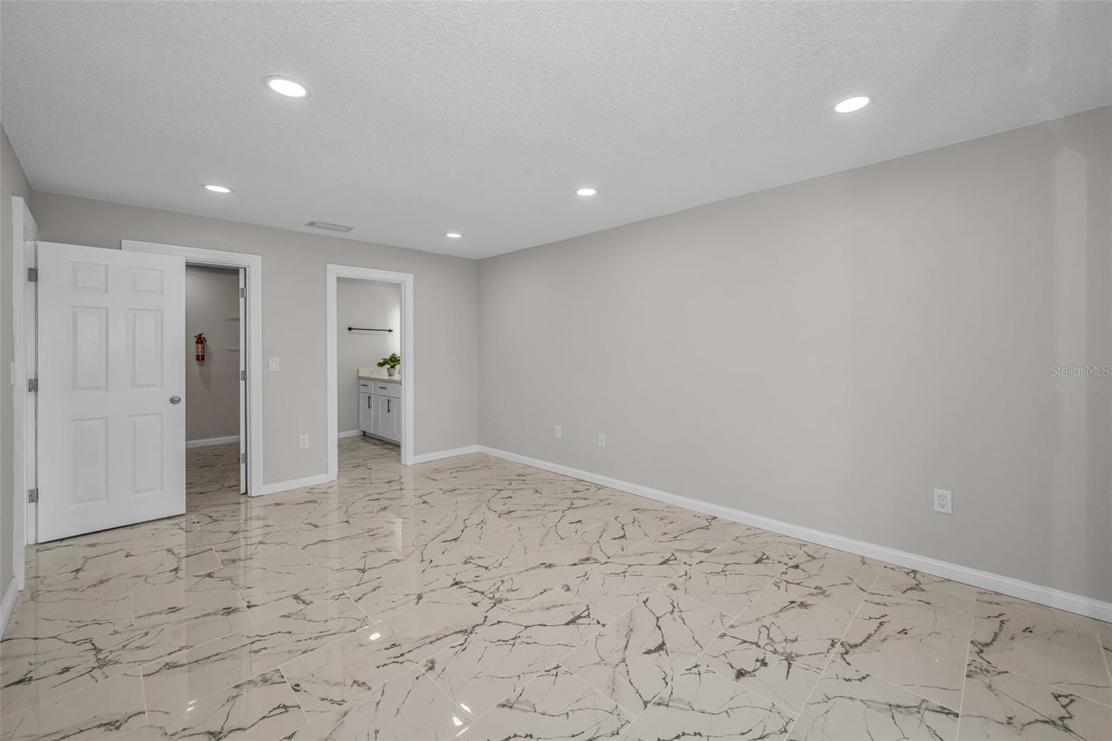 Primary with walk-in closet and bathroom