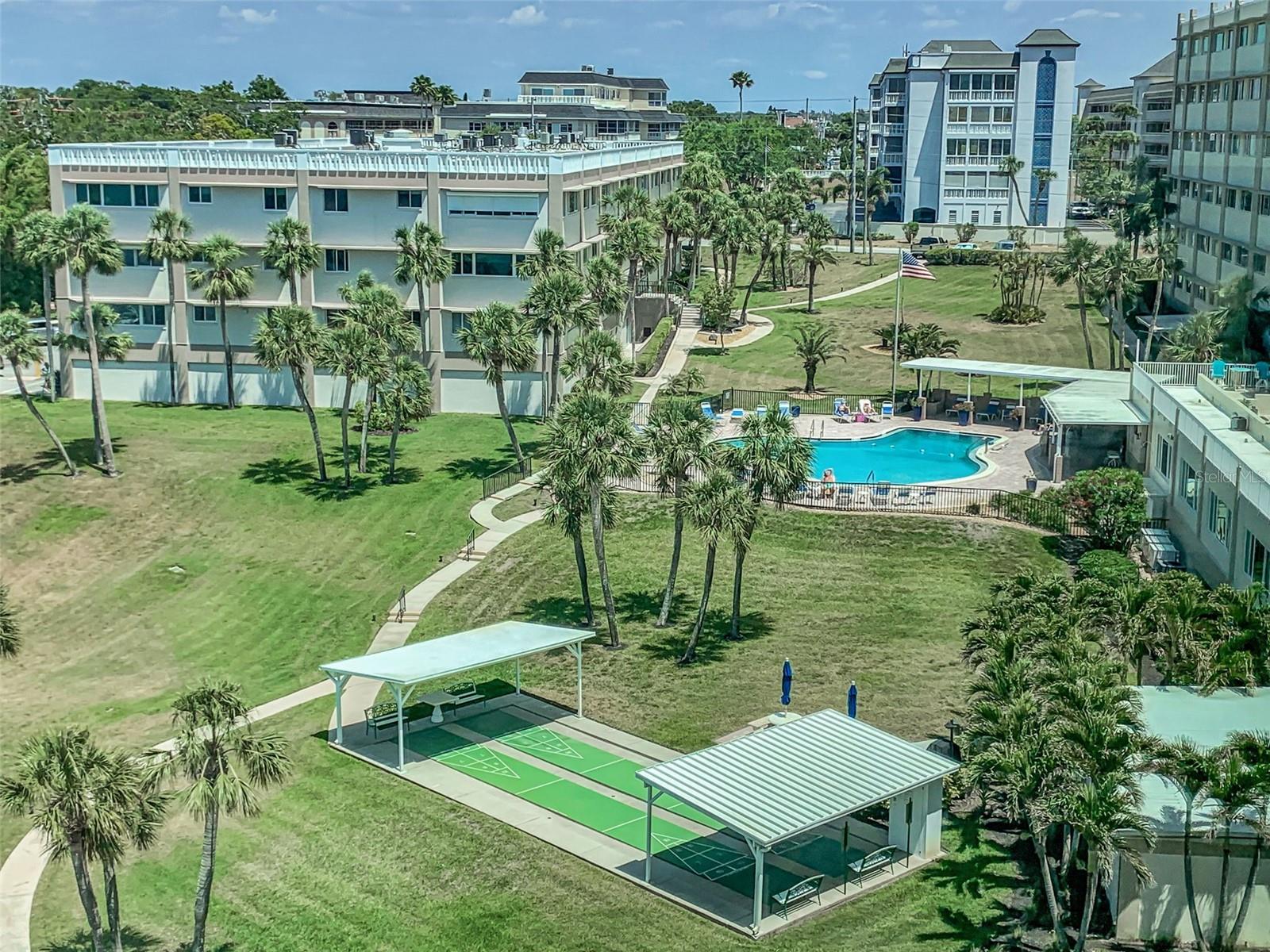 5.2 acres of mature landscaping with Pool and Shuffle Board