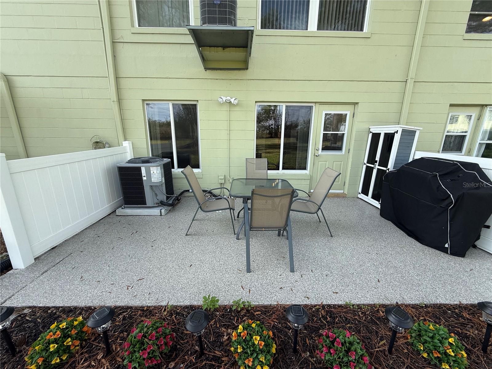 Rear patio with epoxy surface