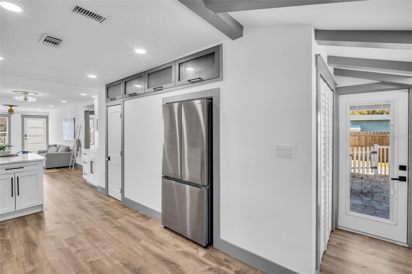 custom kitchen with plenty of cabinets