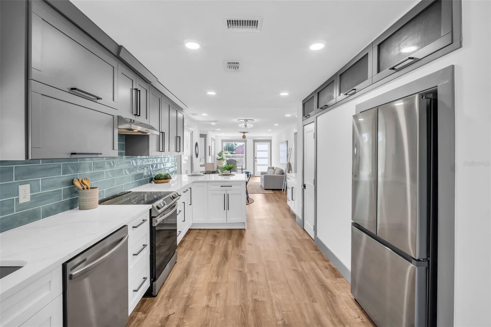 custom kitchen with plenty of cabinets