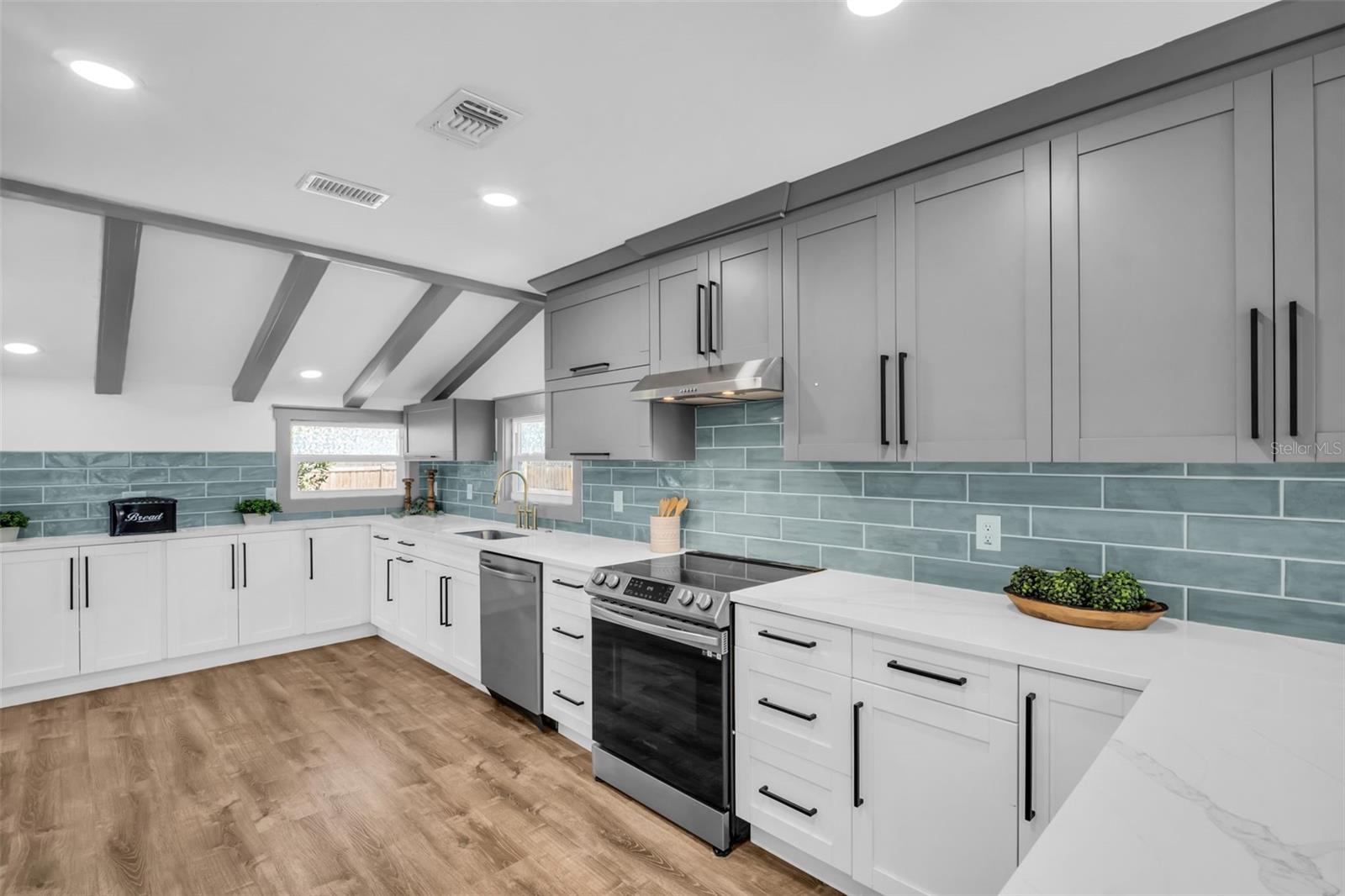 custom kitchen with plenty of cabinets