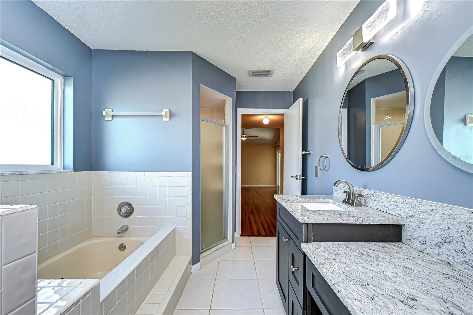 Separate shower and soaking tub!