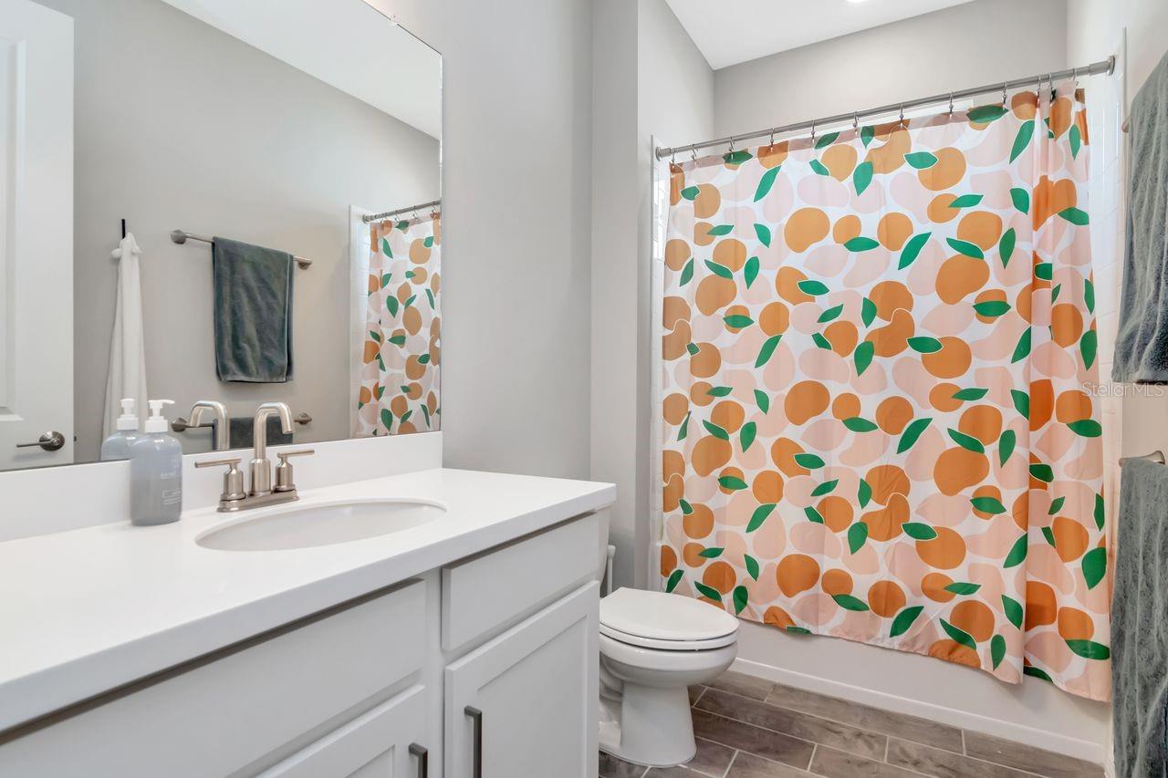 Hall bath between Bedroom 1 and Bedroom 2.