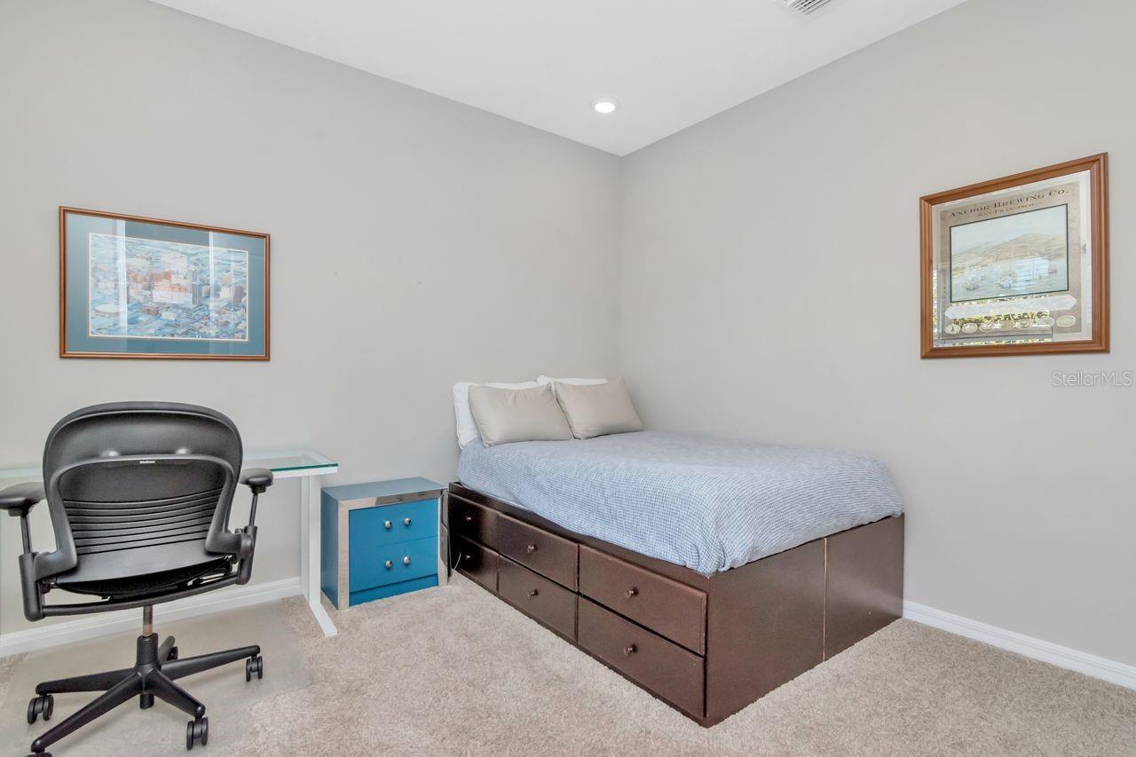 Bedroom 3 located in the front of the home next to bathroom.