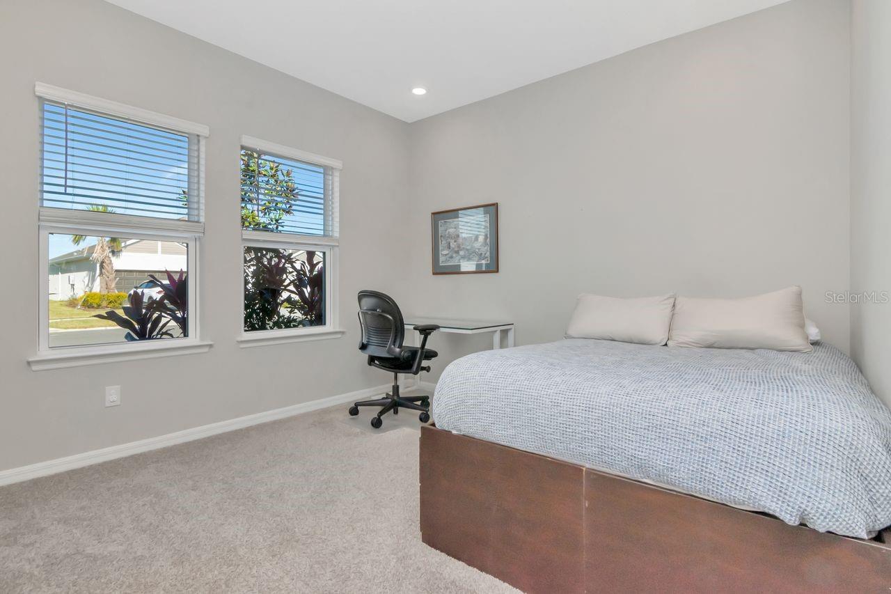 Bedroom 3 located in the front of the home next to bathroom.