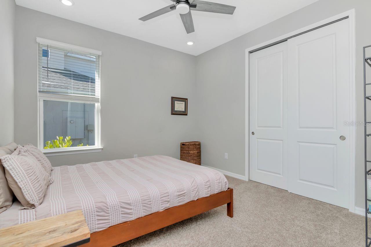 Guest Suite - Bedroom 4 with private ensuite bath.