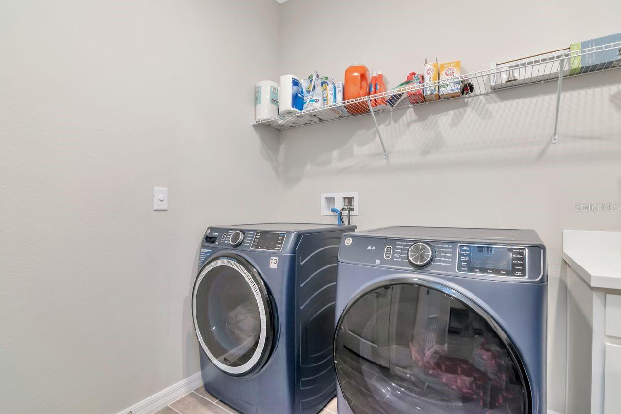 Inside Laundryroom with Utility Sink.